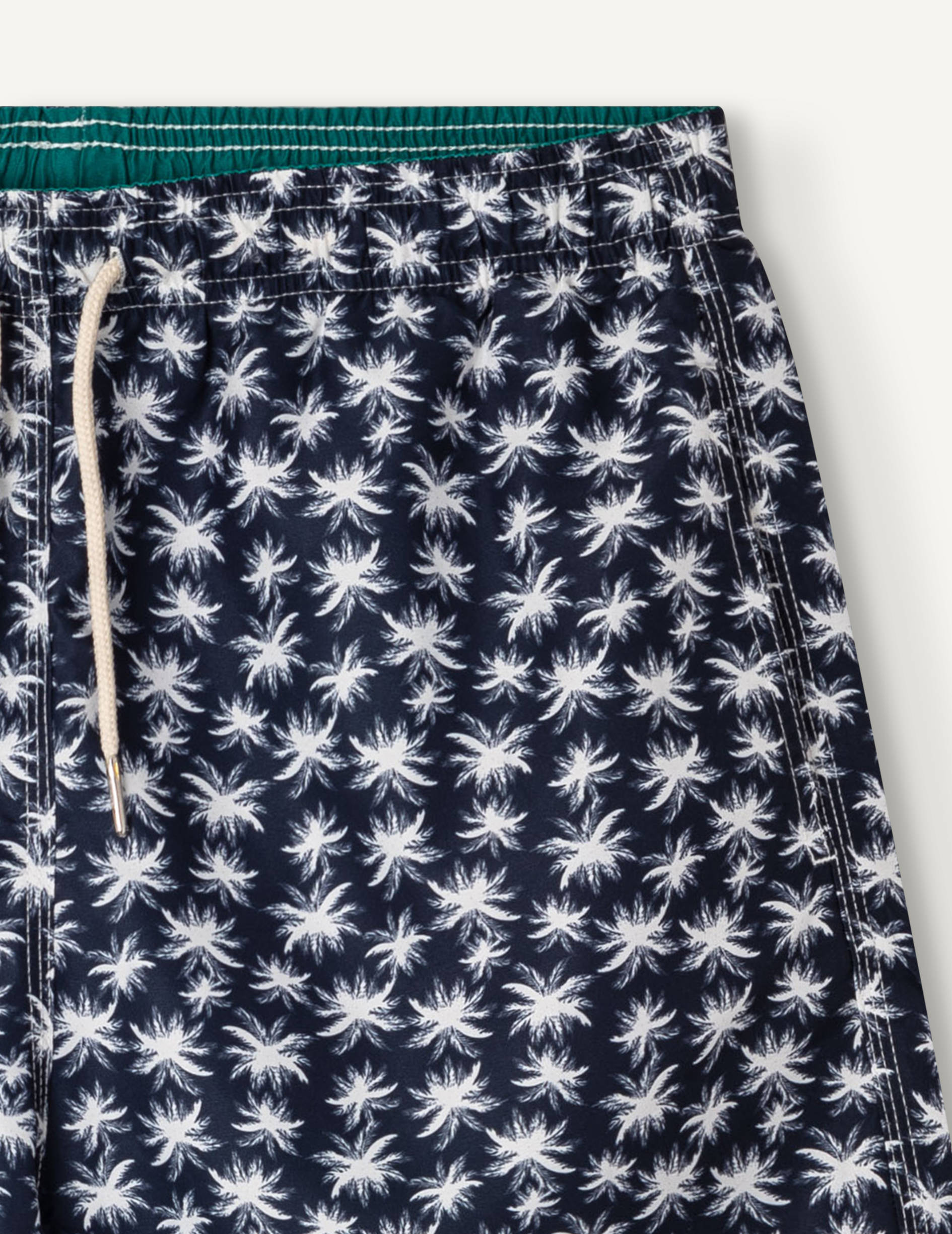 Brieuc navy swimsuit with palm tree patterns