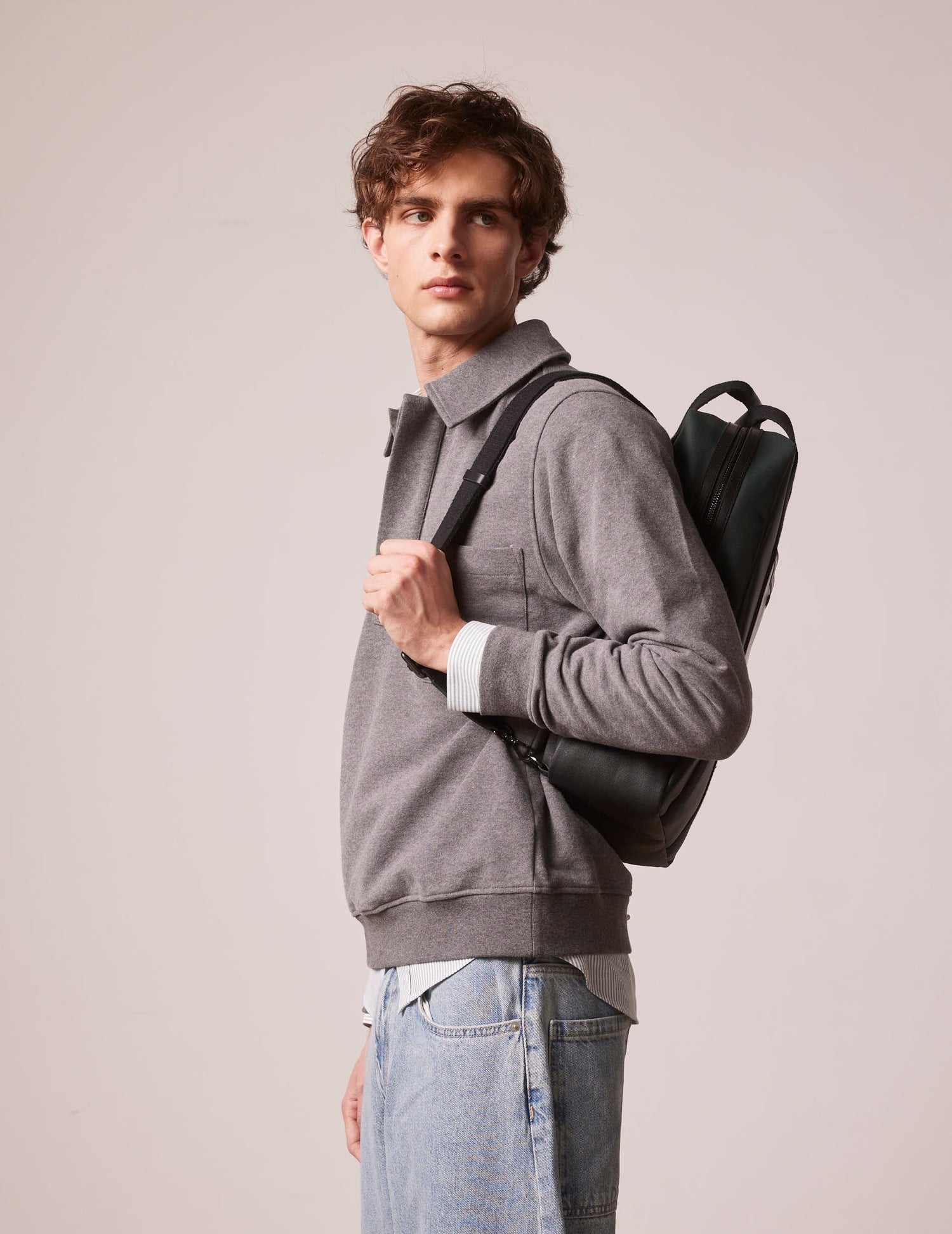 Coated canvas and green leather backpack