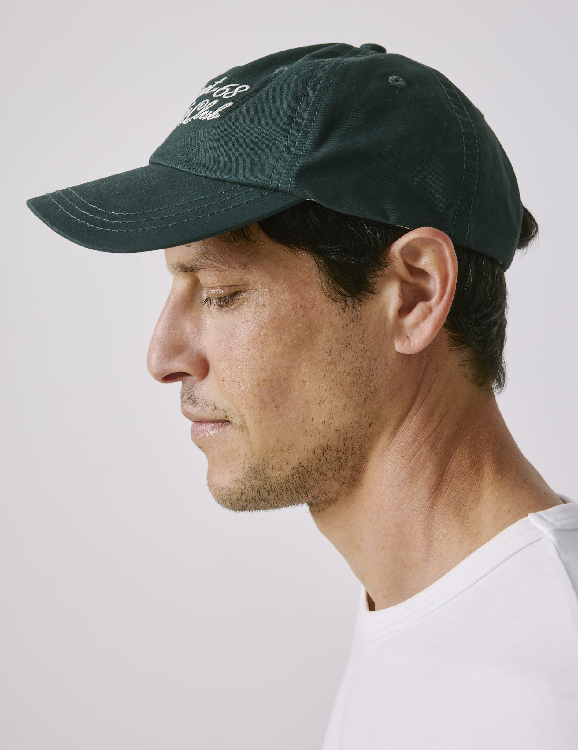 Dark green embroidered cap