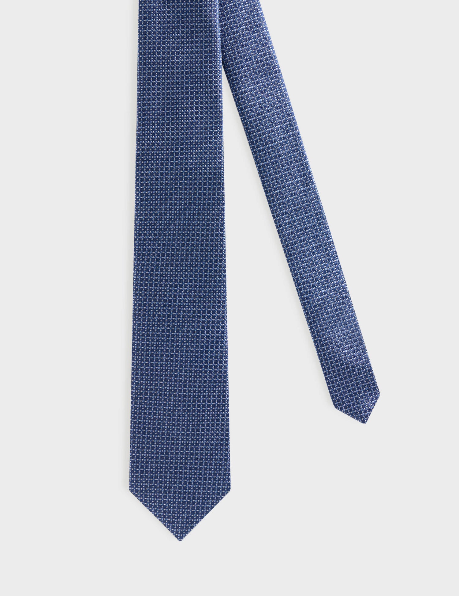Fine patterned blue silk tie
