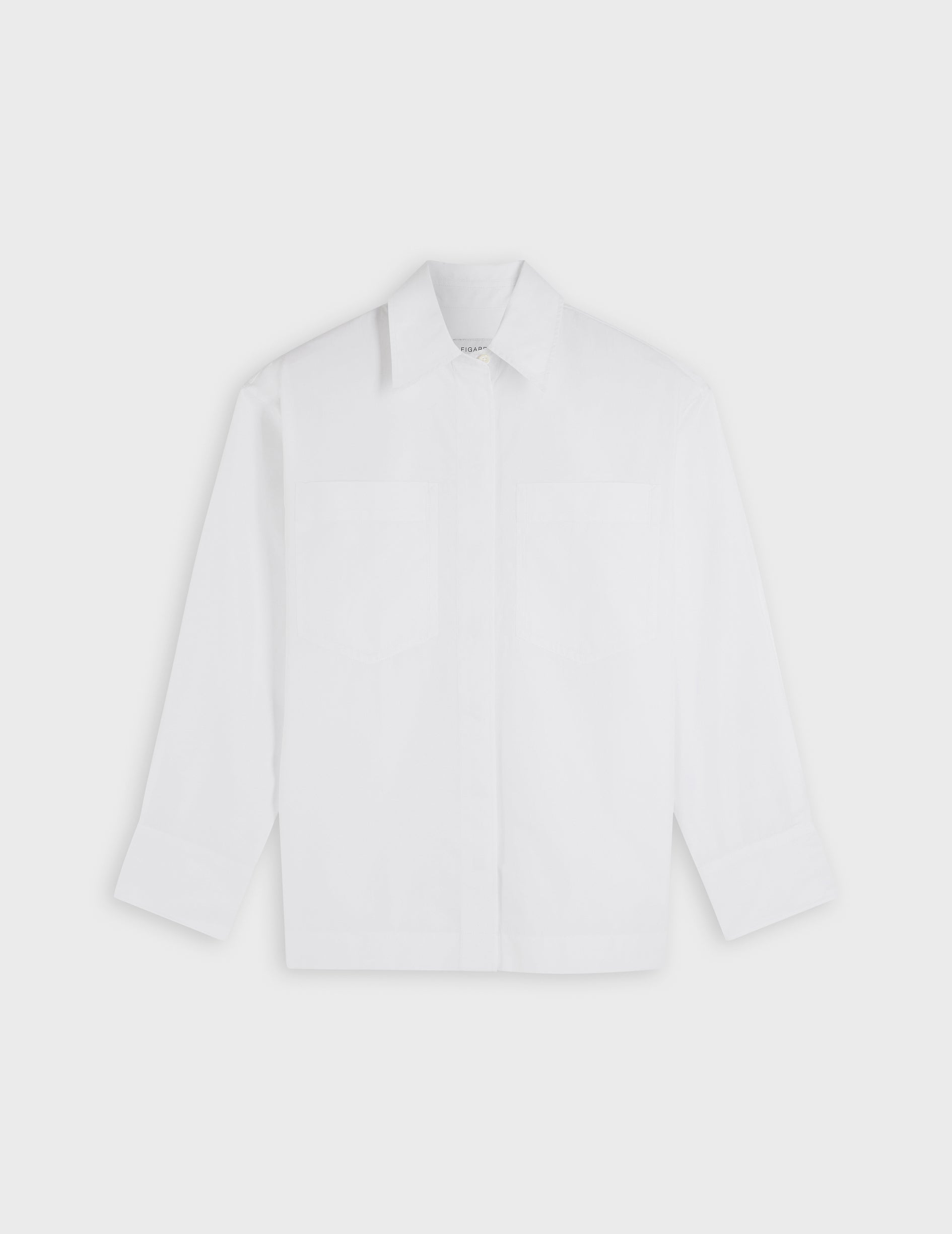 white oversized Faith shirt