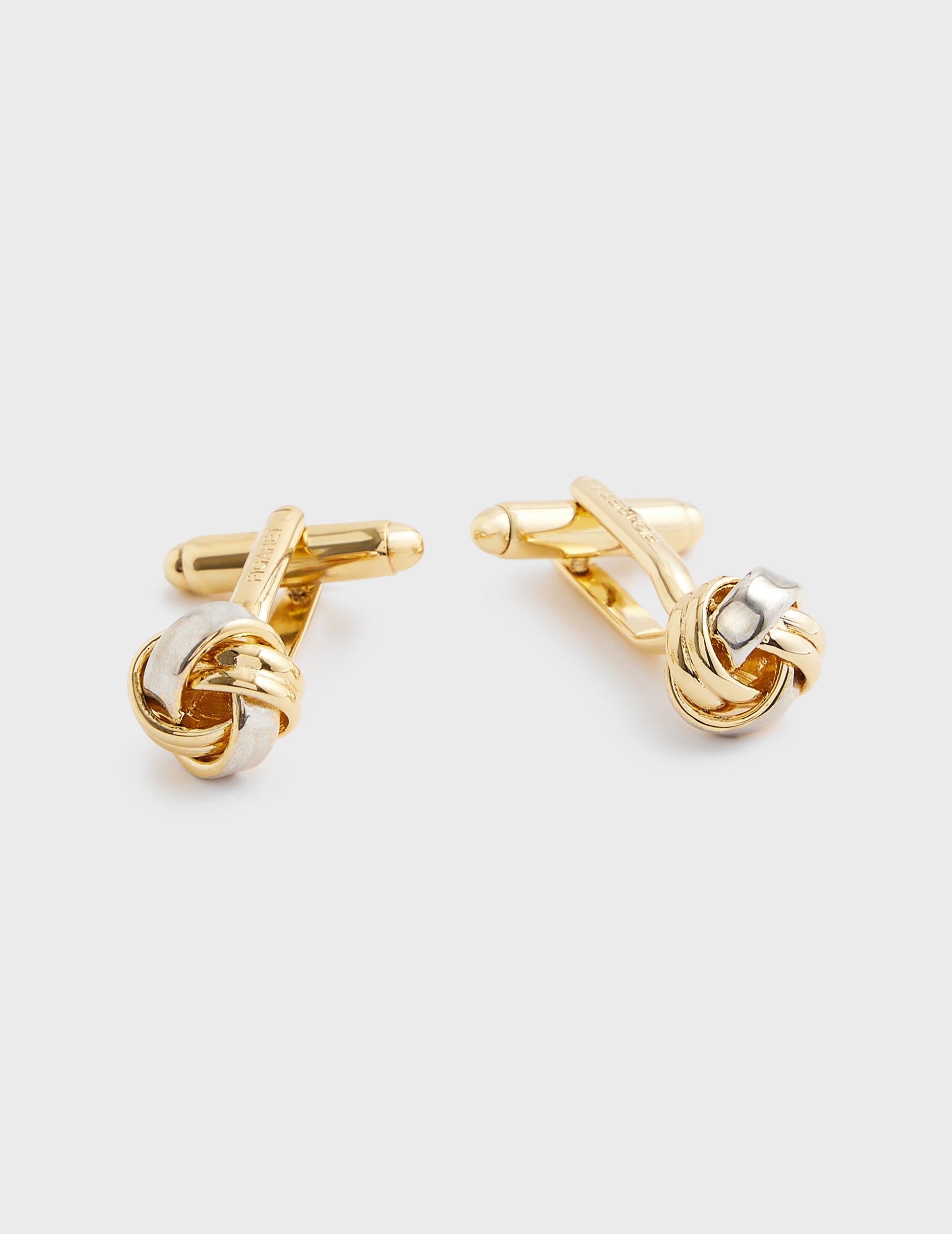 Gold and silver bow cufflinks