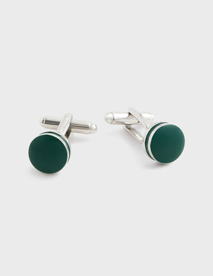 Cufflink with silver hooping and green resin