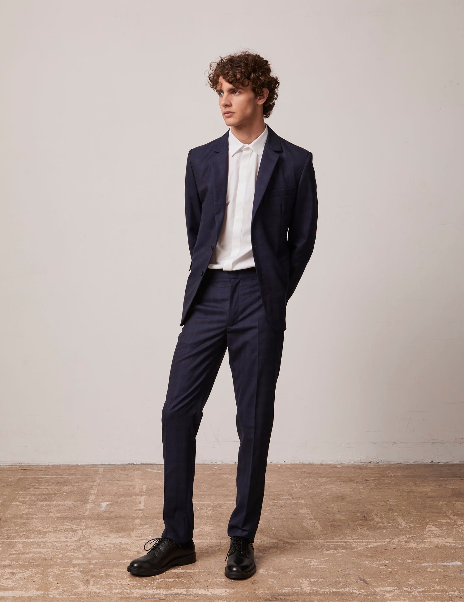 Tailored Greyson pants in navy blue plaid wool canvas