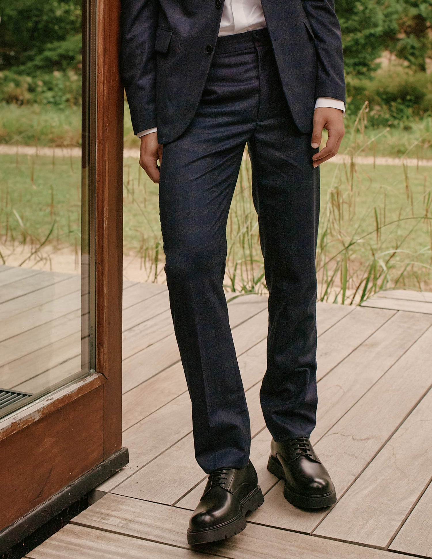 Tailored Greyson pants in navy blue plaid wool canvas