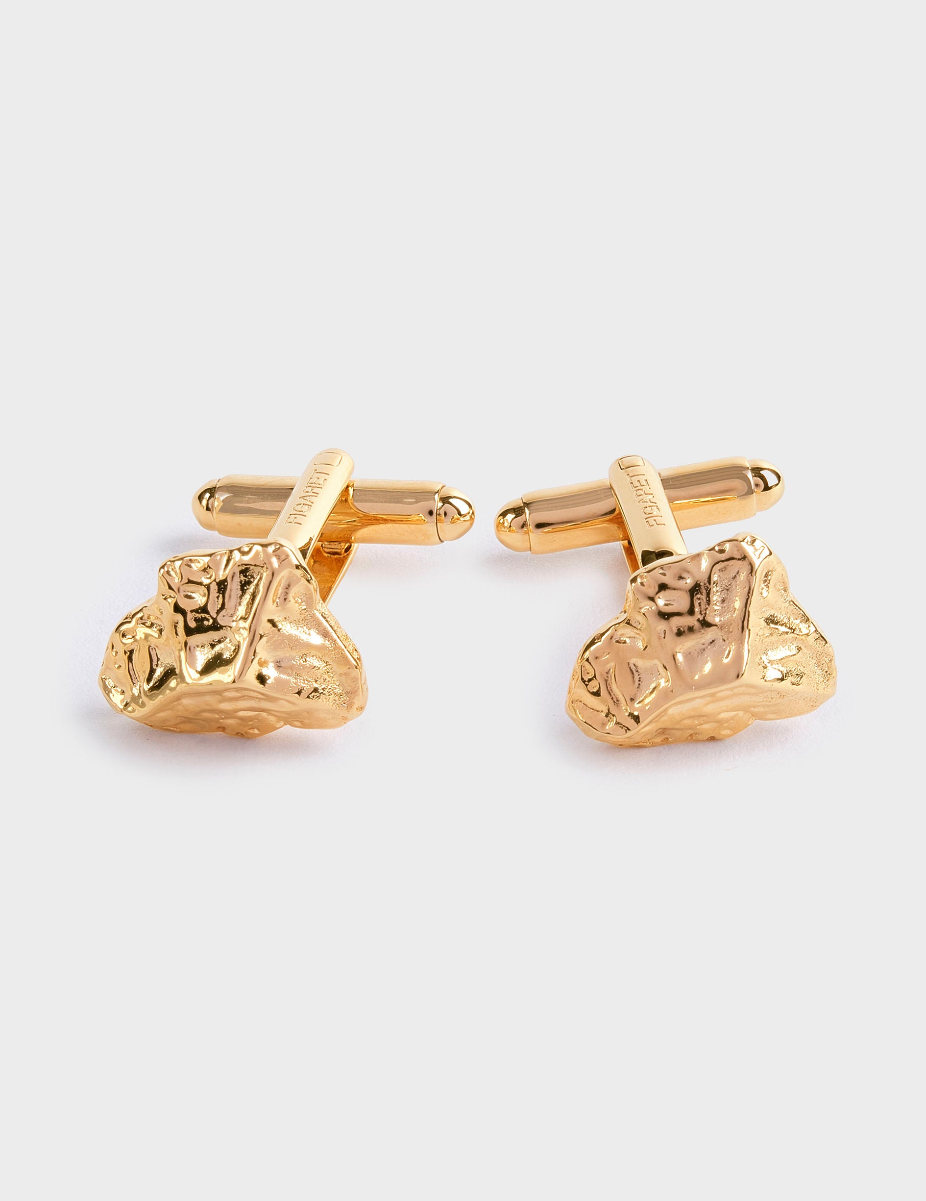 Gold cufflinks