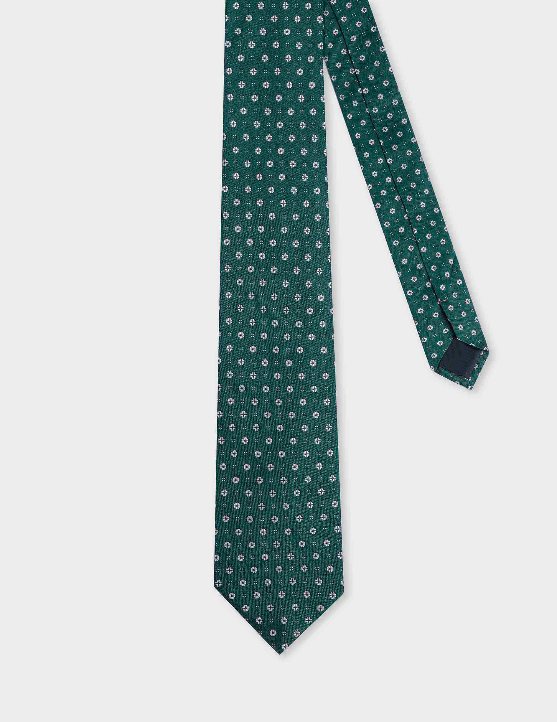 Tie in silk with green floral motifs