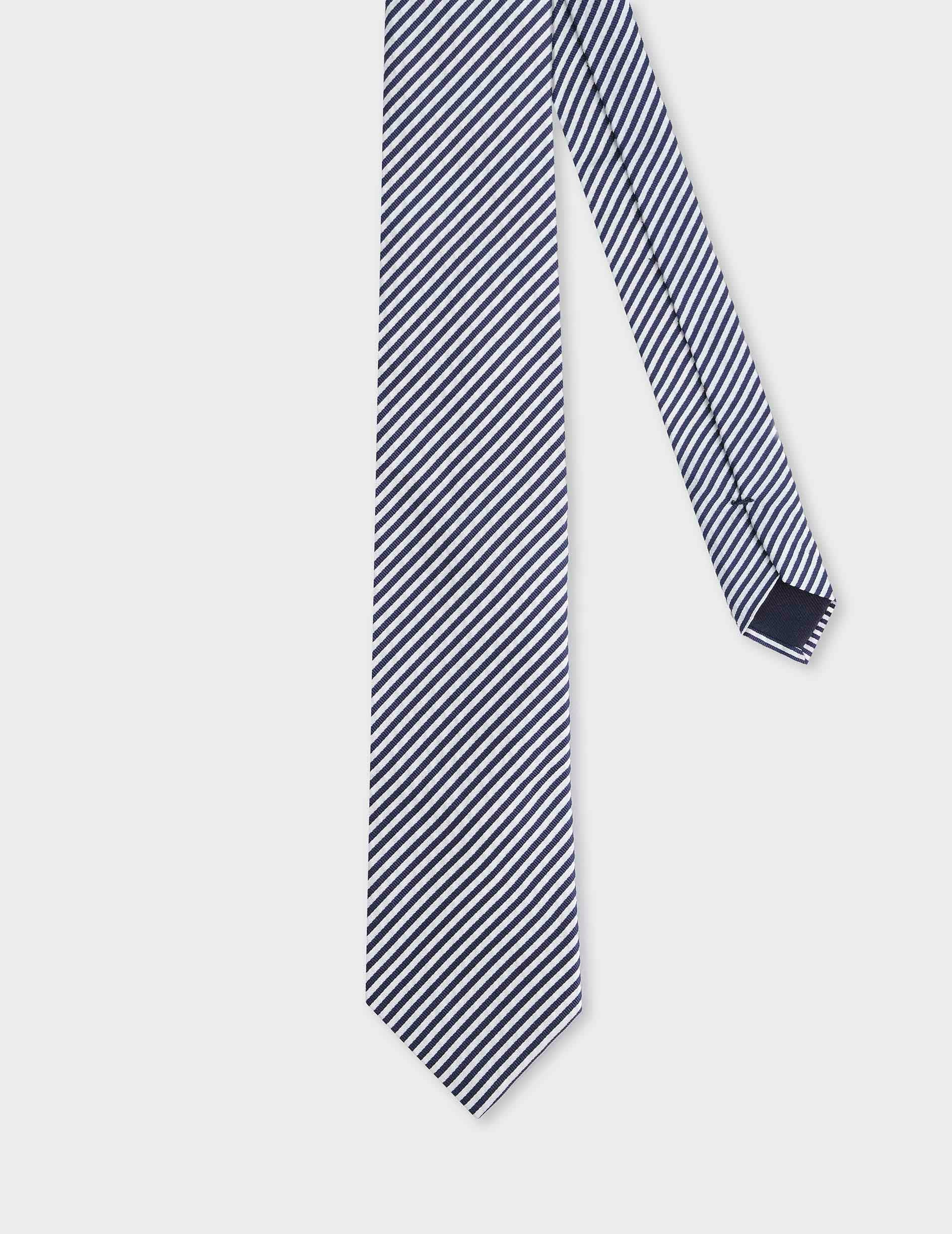 Silk and cotton seersucker tie in navy blue striped