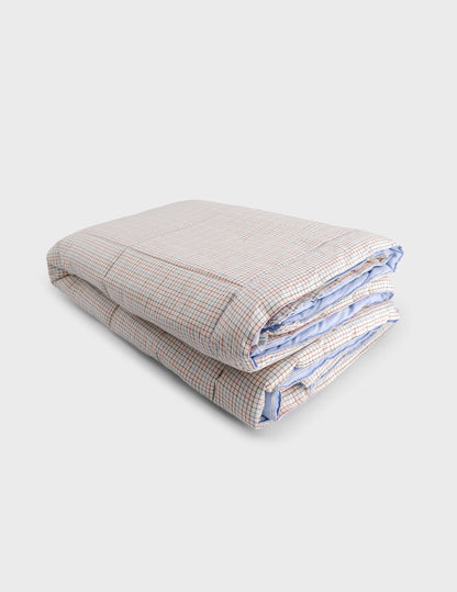 Nido blue and white striped and checked bed quilt