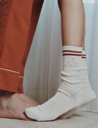Ecru and rust-orange ribbed socks