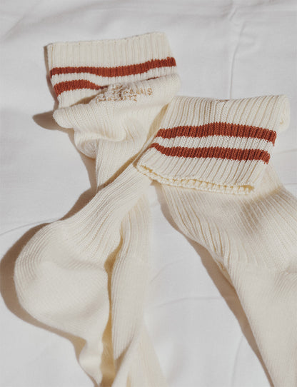 Ecru and rust-orange ribbed socks
