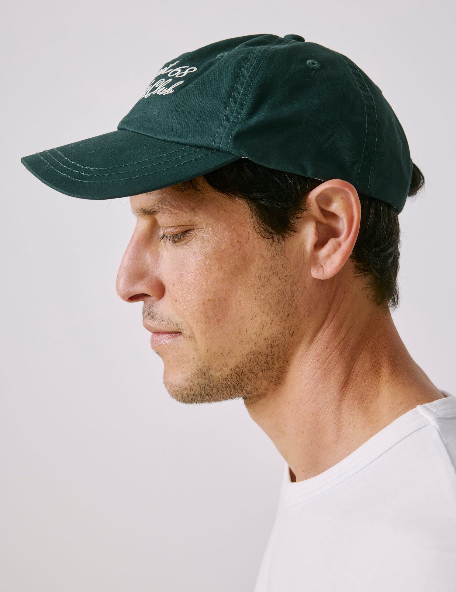 Dark green embroidered cap