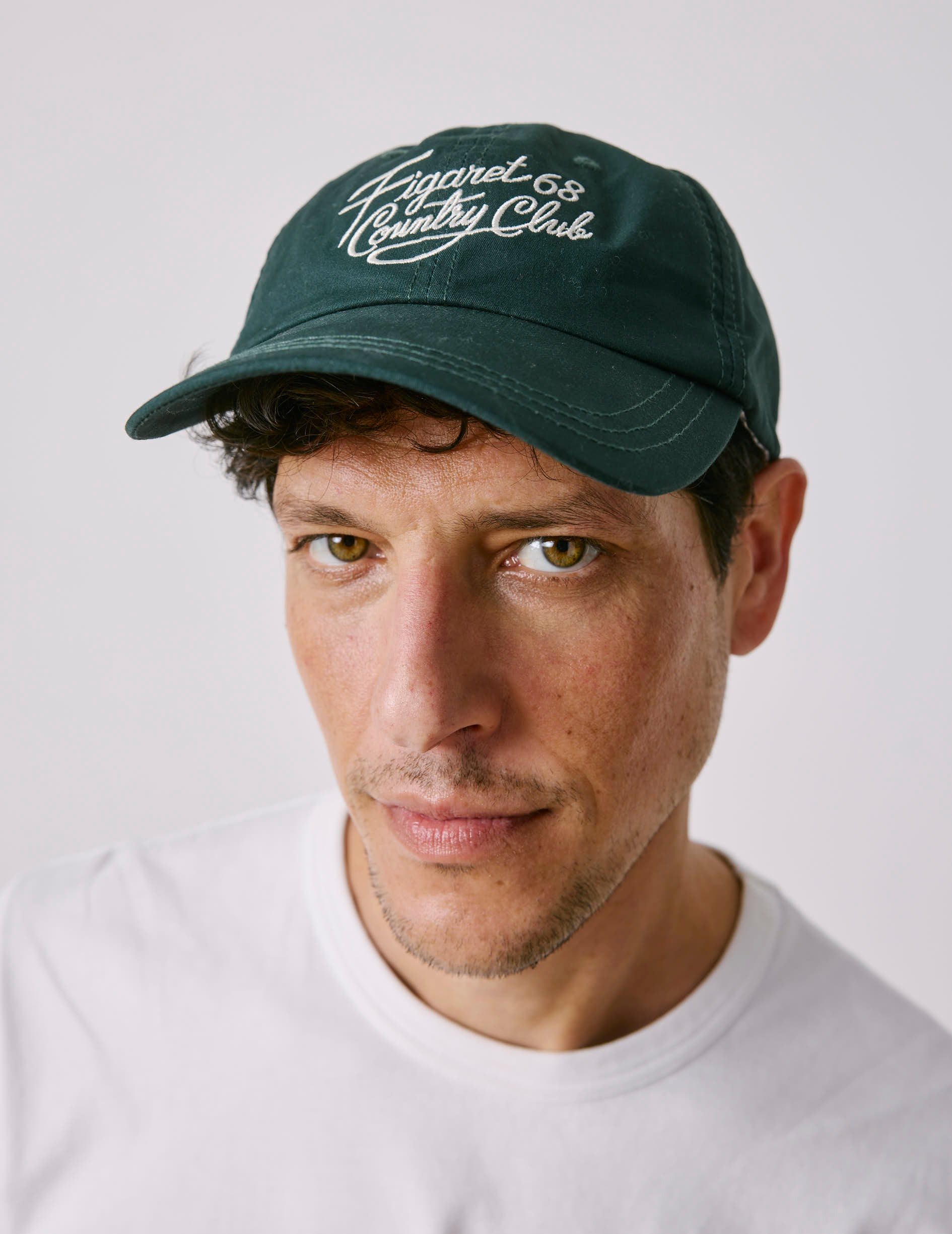 Dark green embroidered cap