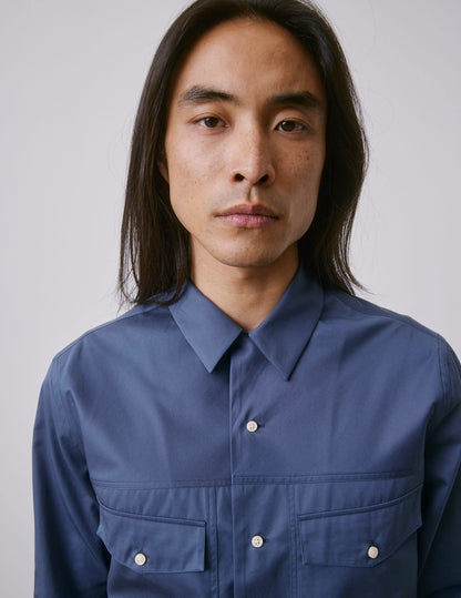 Blue Pharell shirt